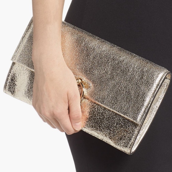 Rebecca Minkoff Handbags - Rebecca Minkoff
Jean Convertible
Leather Clutch Champagne